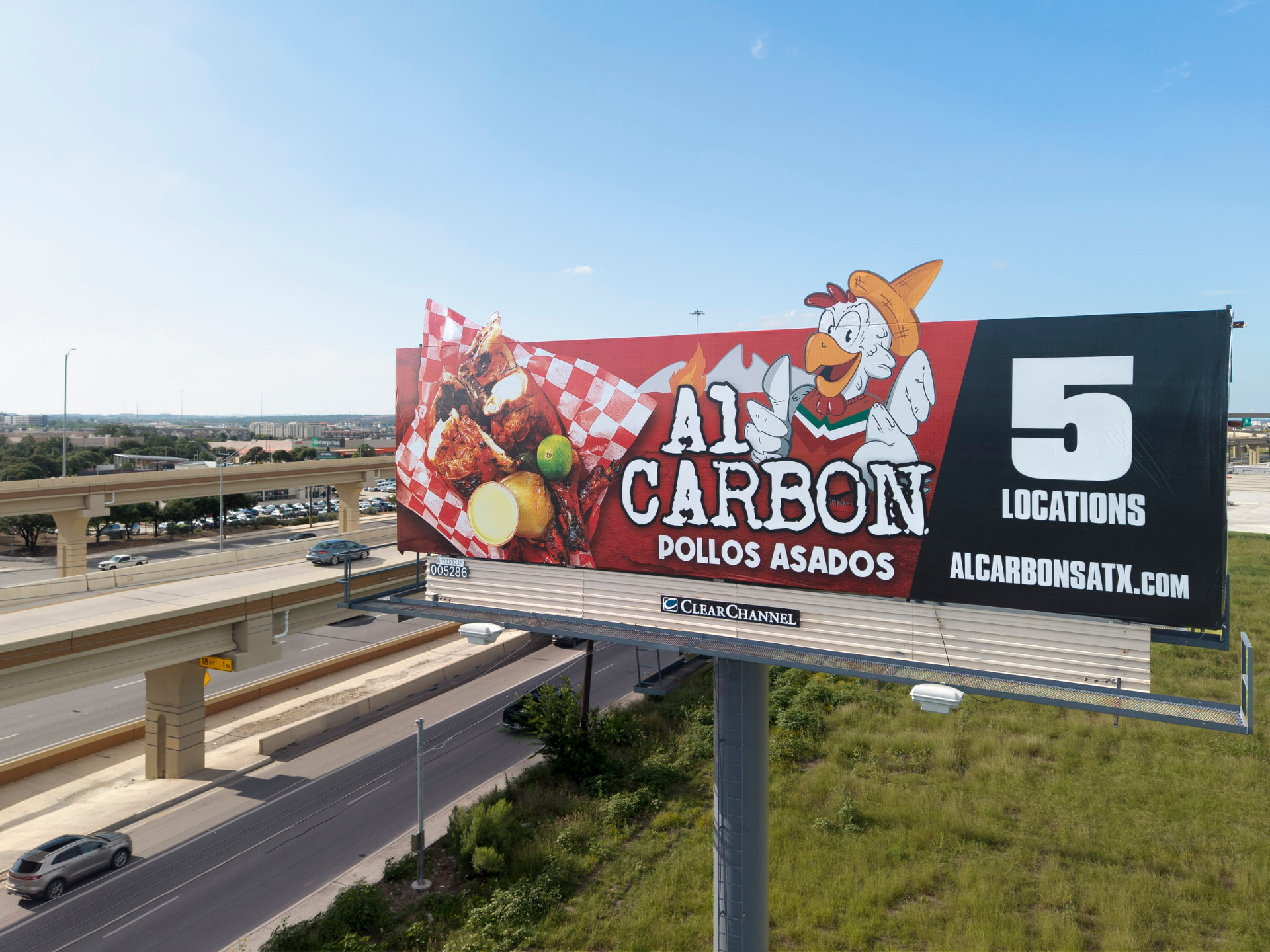 Completed highway billboard campaign photographed by drone for proof of posting
